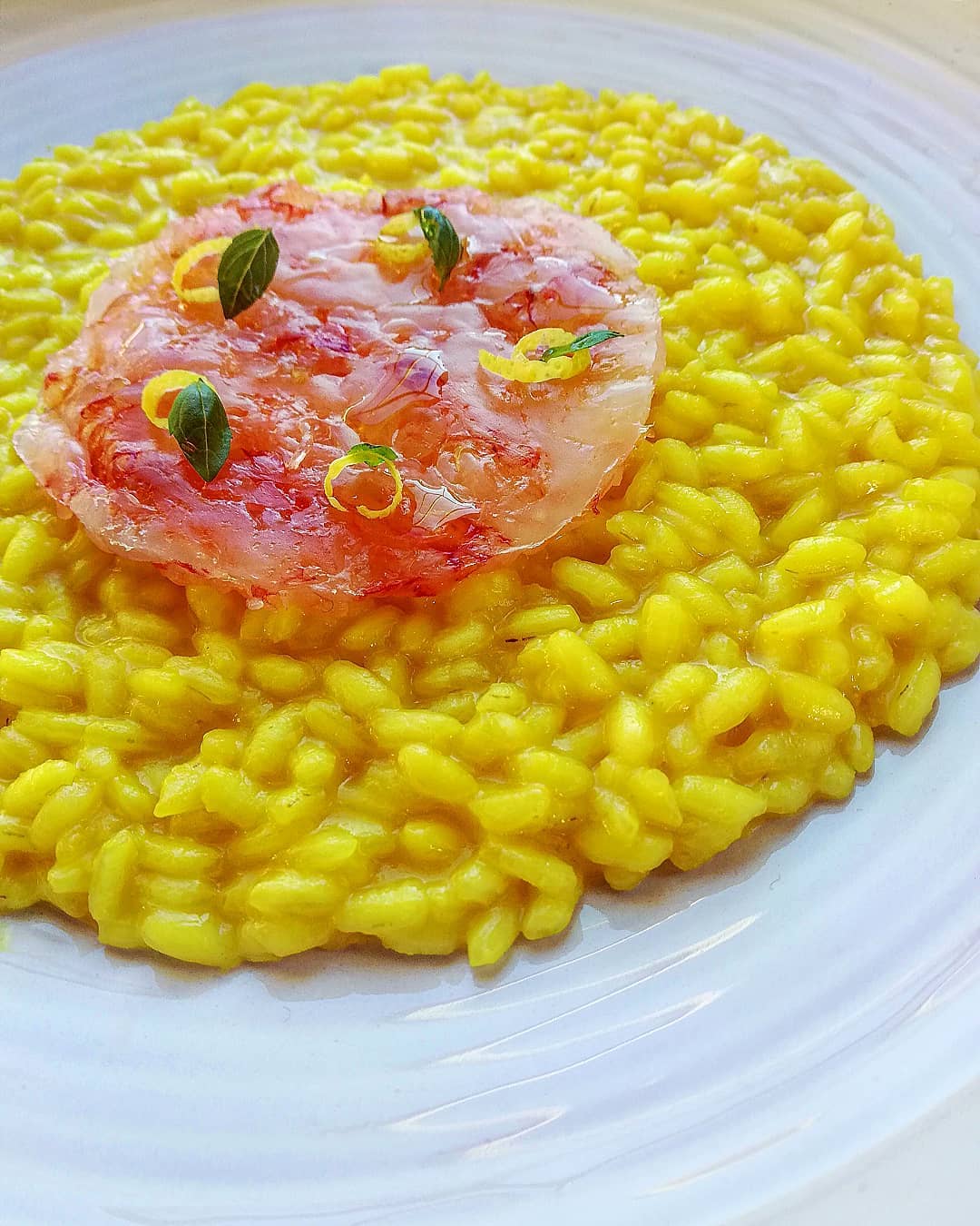 Golden risotto with seafood